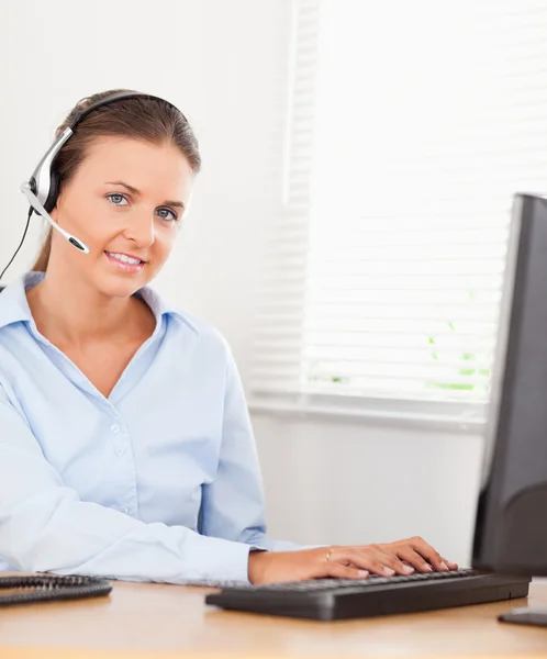 An operator with headset in an office — Stock Photo, Image