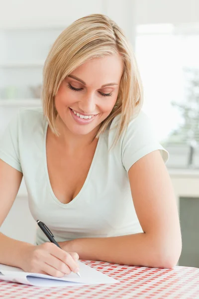 Cute woman proof-reading a text — Stock Photo, Image