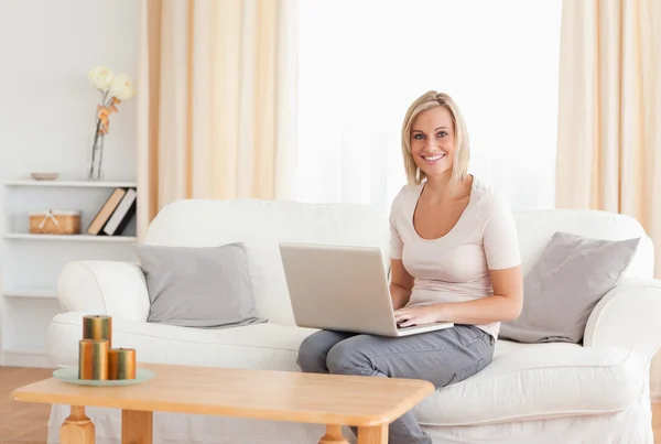 Beautiful woman with a laptop — Stock Photo, Image