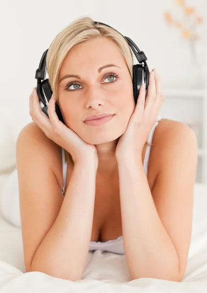 Woman wearing headphones — Stock Photo, Image