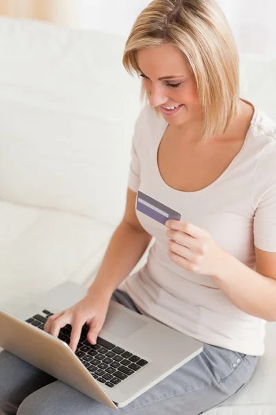 Close up of a charming woman buying online — Stock Photo, Image