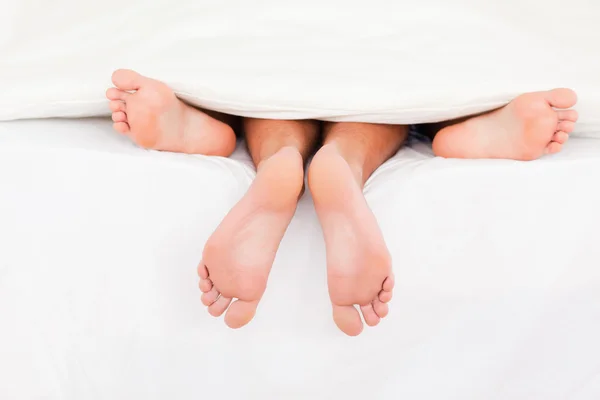 A couple's feet — Stock Photo, Image