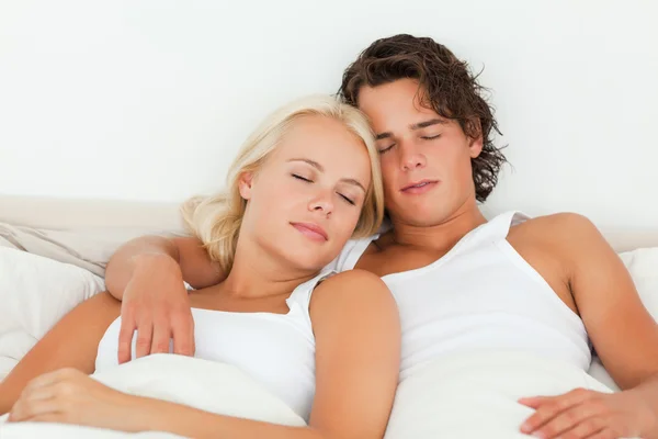 Couple sleeping in their bedroom — Stock Photo, Image