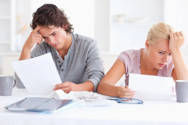 Stressed Couple with Paperwork — Stok fotoğraf