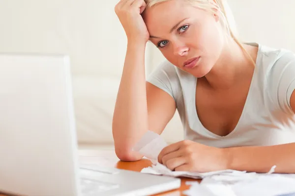 Stressed woman doing paperwork — Stock Photo, Image