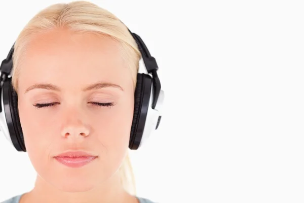 Close up of a gorgeous woman with headphones — Stock Photo, Image