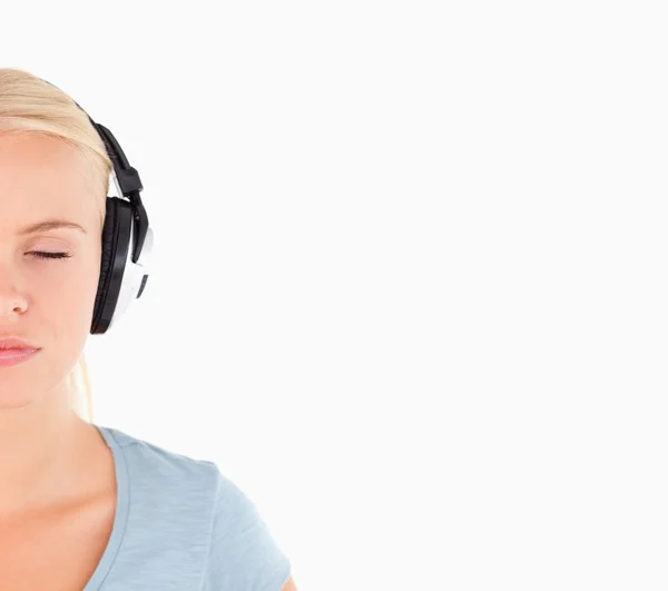 Close up of a charming woman with headphones — Stock Photo, Image