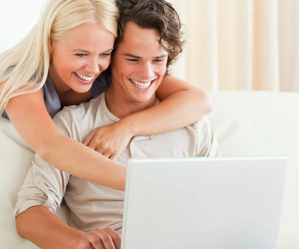 Couple using a laptop — Stock Photo, Image
