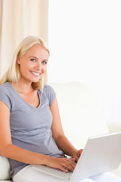 Portrait of a lovely woman with a laptop — Stock Photo, Image