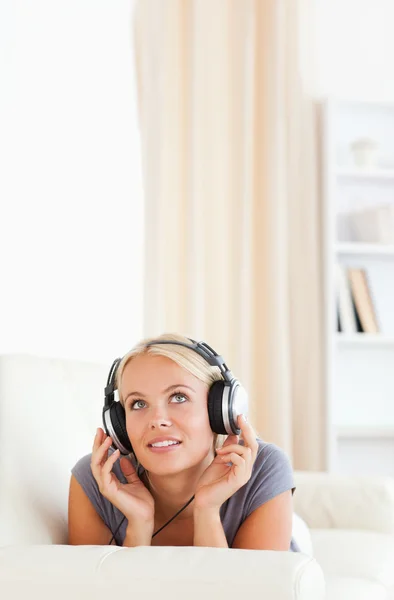 Portrait of a woman listening to music — Stock Photo, Image