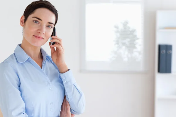 Charming brunette businesswoman on the phone — Stock Photo, Image