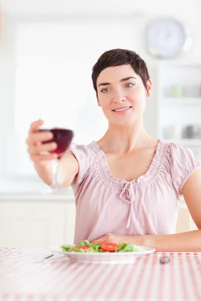 Charming Woman toasting with wine — Stock Photo, Image