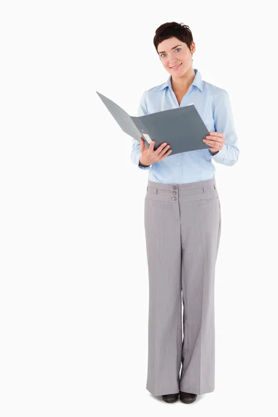 Woman holding a binder — Stock Photo, Image