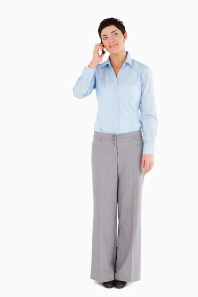 Serious woman making a phone call — Stock Photo, Image