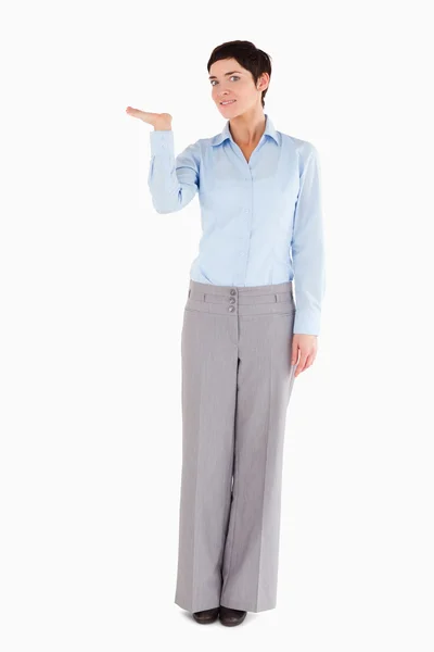 Woman with an open hand to show a copy space — Stock Photo, Image