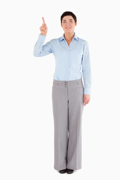 Woman pointing at copy space — Stock Photo, Image