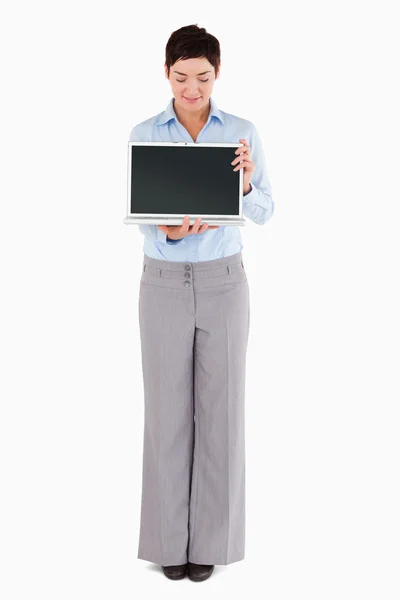 Woman showing a notebook — Stock Photo, Image