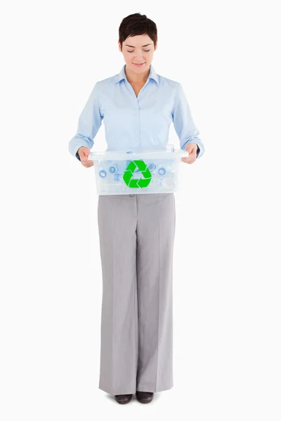 Businesswoman with a recycling box — Stock Photo, Image