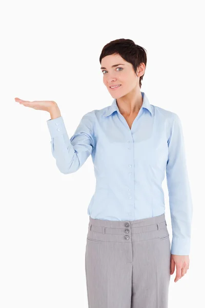 Businesswoman with hand open to show a copy space — Stock Photo, Image