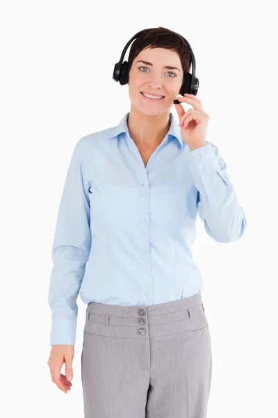 Portrait of an office worker with a headset — Stock Photo, Image