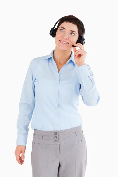 Portret uśmiechający się pracownik biurowy z zestawu słuchawkowego — Zdjęcie stockowe