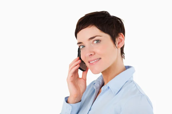 Close up of a serious woman on the phone — Stock Photo, Image