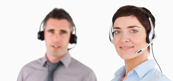 Close-up van managers met behulp van headsets — Stockfoto