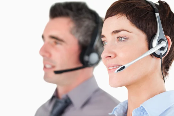 Close up of operators with headsets — Stock Photo, Image