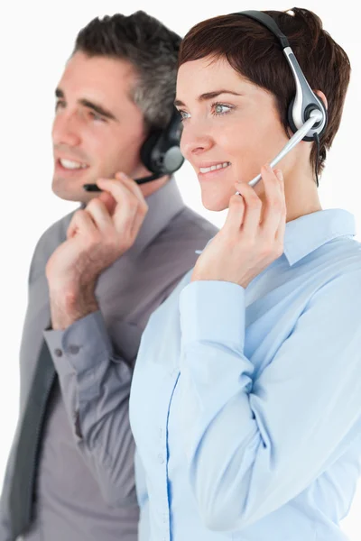 Portrait of operators with headsets — Stock Photo, Image