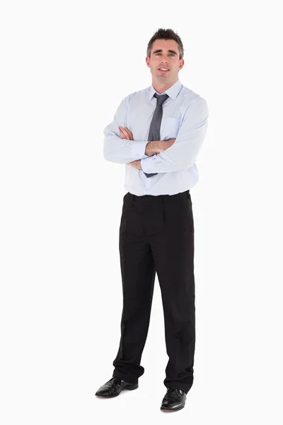 Businessman standing up with his arms crossed — Stock Photo, Image