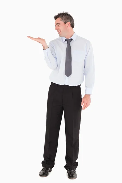 Businessman showing a copy space — Stock Photo, Image
