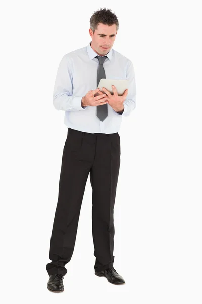 Businessman using a tablet computer — Stock Photo, Image