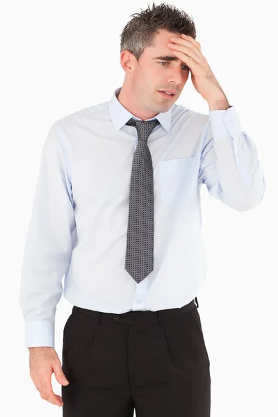 Portrét smutné podnikatel s rukou na čelo — Stock fotografie