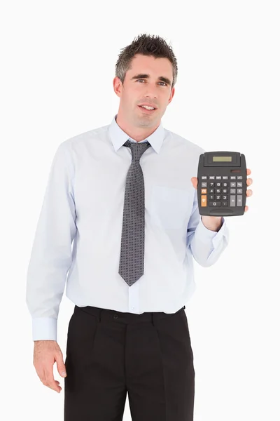 Comptable montrant une calculatrice — Photo