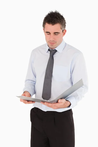 Portrait of a man looking a binder — Stock Photo, Image