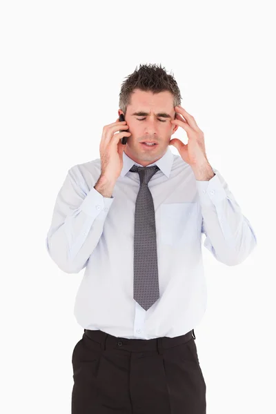 Portrait of a depressed man making a phone call — Stock Photo, Image