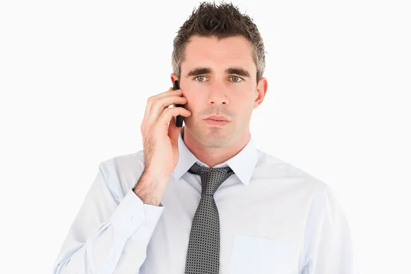 Homem infeliz fazendo um telefonema — Fotografia de Stock