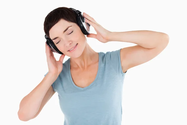 Close up of a woman enjoying some music — Stock Photo, Image