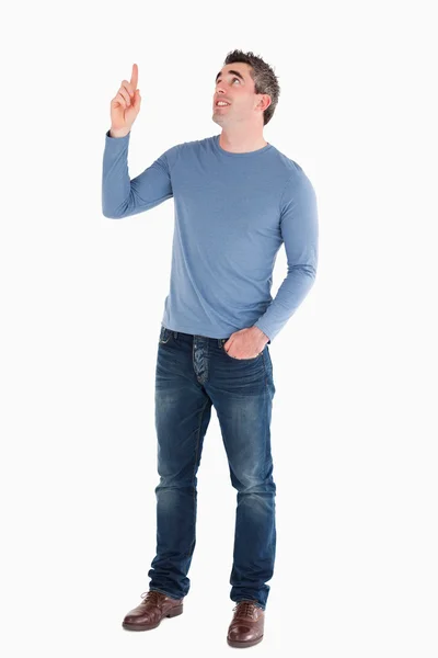 Handsome man pointing at copy space — Stock Photo, Image
