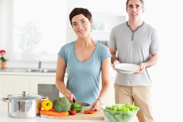 Smiling Couple preparing lunch — Stock Photo, Image