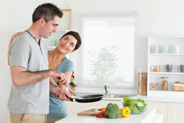 Woman smiling at her husband — Stock Photo, Image