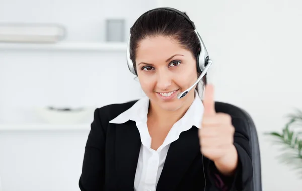 Cute operator with thumb up — Stock Photo, Image