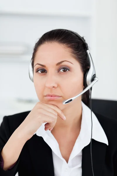Thoughtful young operator in office — Stock Photo, Image