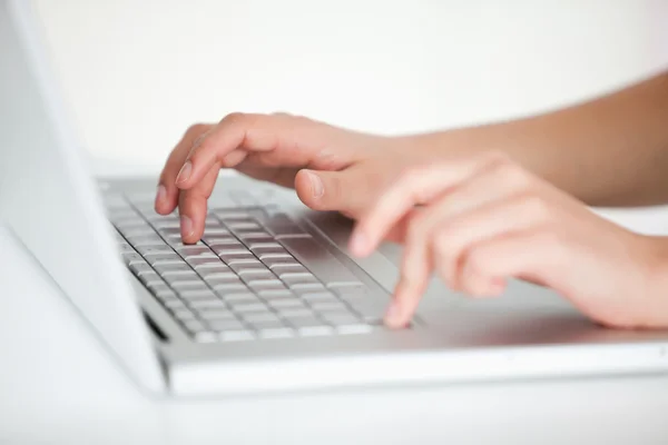 Hands typing on keyboard — Stock Photo, Image