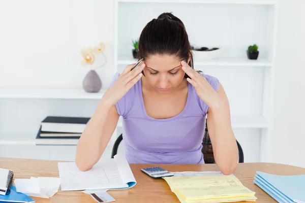 Stressed young woman accounting — Stock Photo, Image