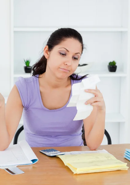 Tired young female accounting — Stock Photo, Image