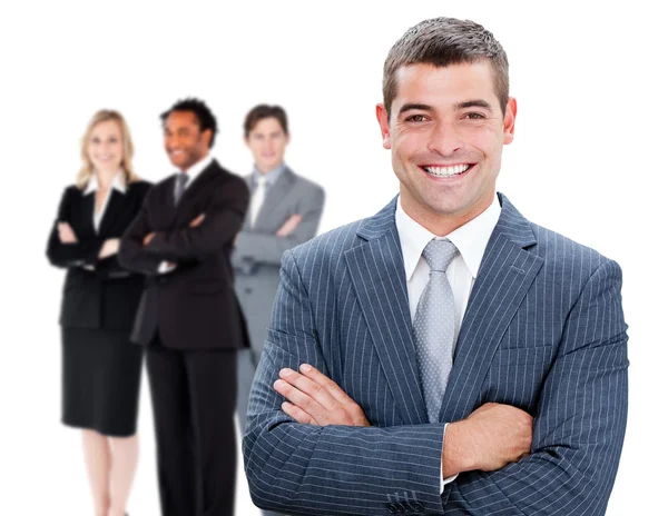Businessman in front of colleagues — Stock Photo, Image