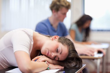 Tired student sleeping clipart