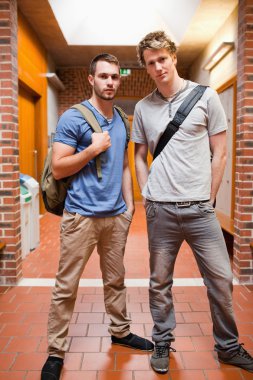 Portrait of handsome students posing clipart