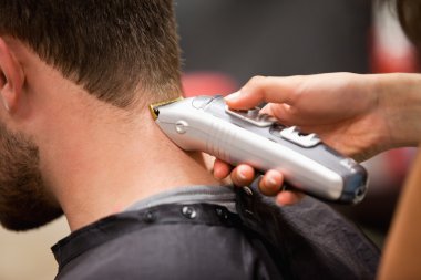 Man having a haircut clipart
